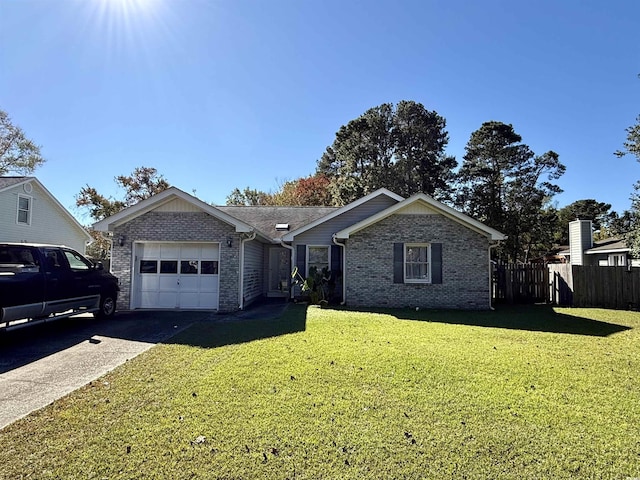 single story home with a front yard and a garage