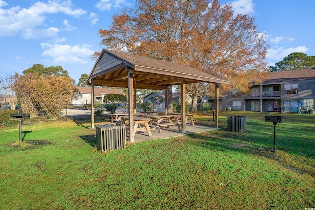 view of community featuring a gazebo and a yard