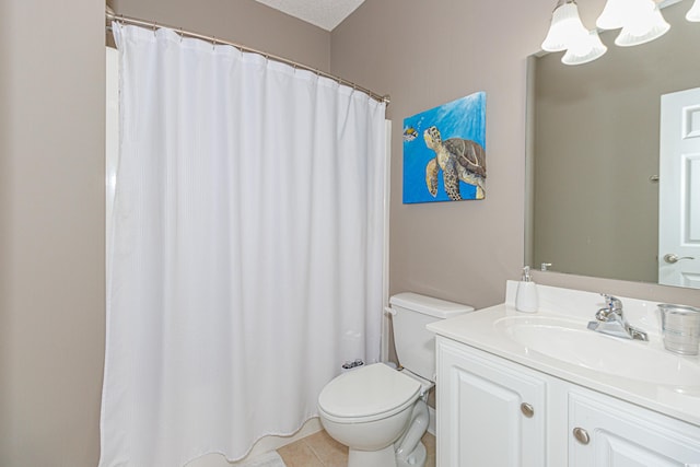 bathroom featuring a textured ceiling, vanity, tile patterned flooring, a chandelier, and toilet