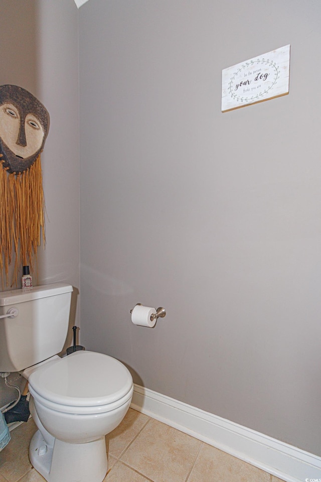 bathroom with tile patterned flooring and toilet