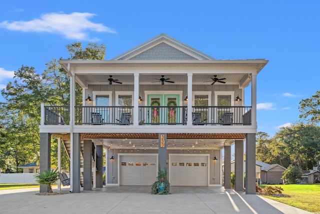 view of front of house featuring a garage and a carport