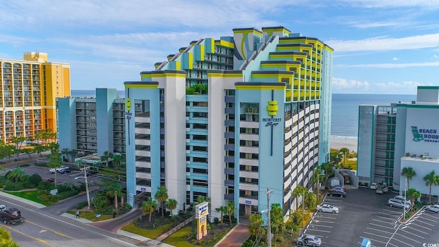 view of building exterior with a water view