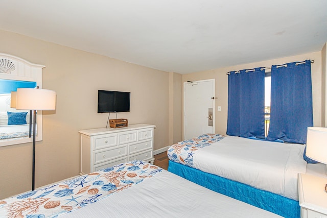 bedroom with wood-type flooring