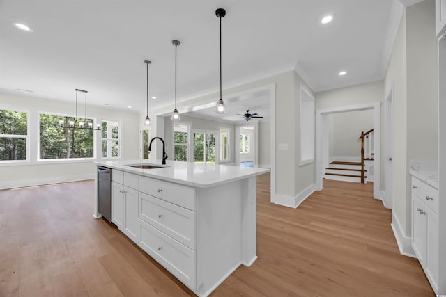 604 Mccown Dr, Conway, SC 29526 - unfurnished living room with ornamental molding, stairway, ceiling fan, dark wood-style flooring, and baseboards