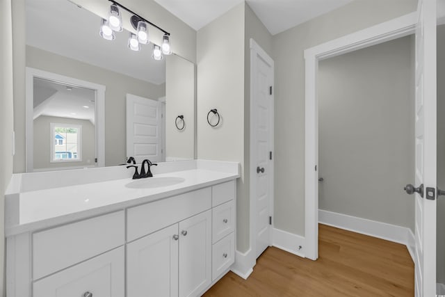 604 Mccown Dr, Conway, SC 29526 - bathroom featuring vanity, wood finished floors, and baseboards