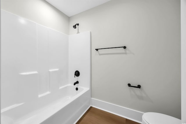 604 Mccown Dr, Conway, SC 29526 - full bath featuring toilet, wood finished floors, bathtub / shower combination, and baseboards