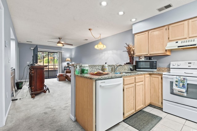 kitchen featuring white appliances, light carpet, ceiling fan, a textured ceiling, and extractor fan