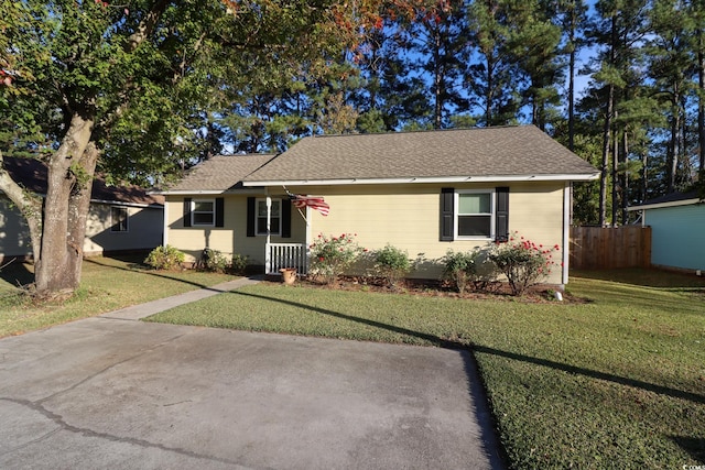 ranch-style house with a front yard