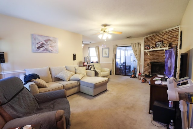 carpeted living room with ceiling fan