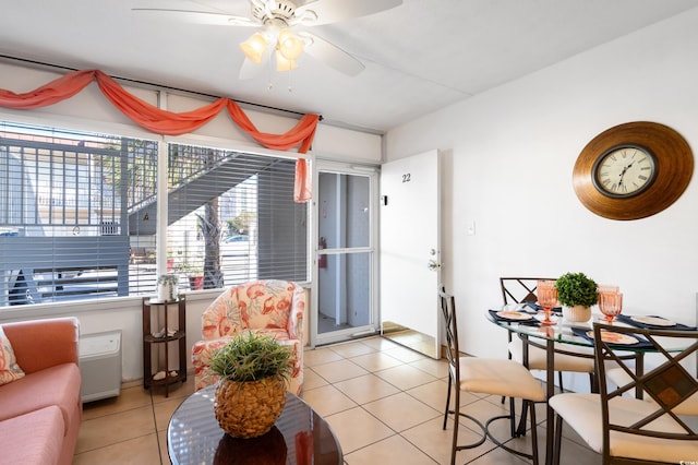 tiled living room featuring ceiling fan