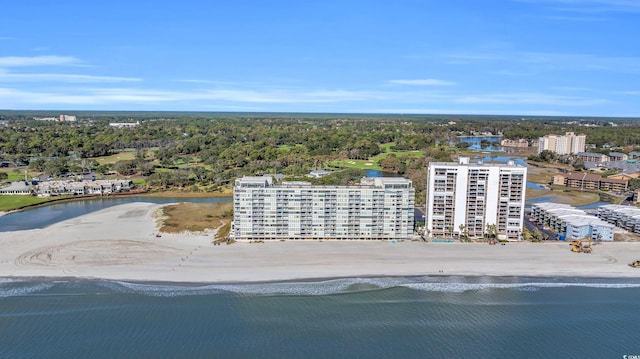 aerial view with a water view and a beach view