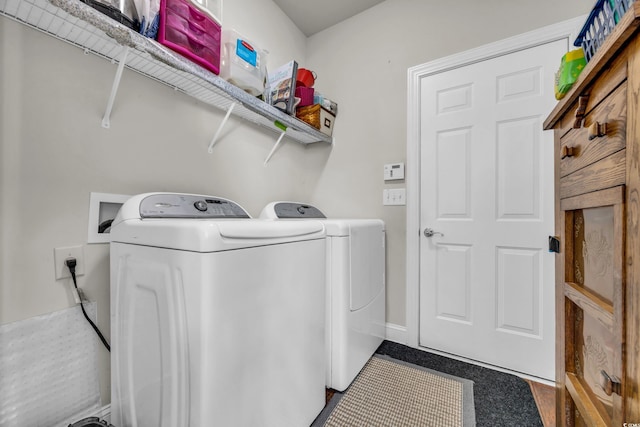 laundry area featuring washing machine and dryer