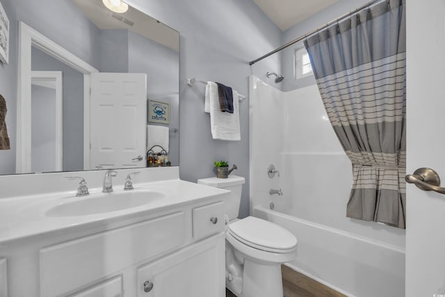 full bathroom with shower / bath combination with curtain, vanity, toilet, and hardwood / wood-style floors