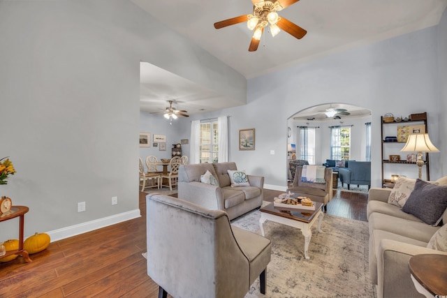 living room featuring dark wood-type flooring