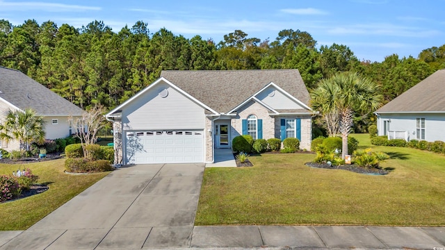 ranch-style house featuring a front lawn and a garage