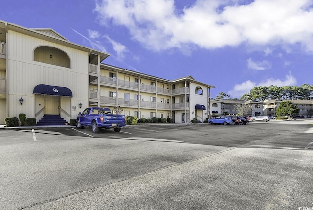 4103 Pinehurst Cir Unit Bb-14, Little River, SC 29566 - view of apartment building / complex featuring uncovered parking