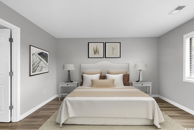 4103 Pinehurst Cir Unit Bb-14, Little River, SC 29566 - bedroom with wood finished floors and baseboards