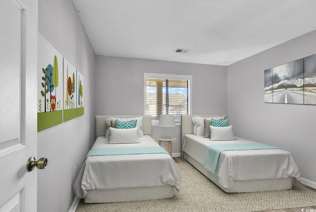 4103 Pinehurst Cir Unit Bb-14, Little River, SC 29566 - bedroom featuring baseboards and wood finished floors