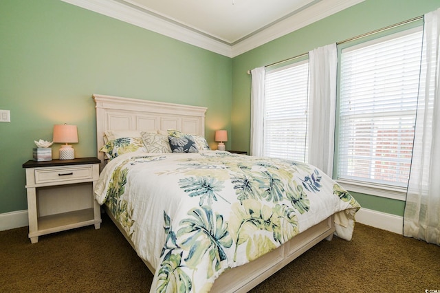 bedroom featuring dark colored carpet and crown molding