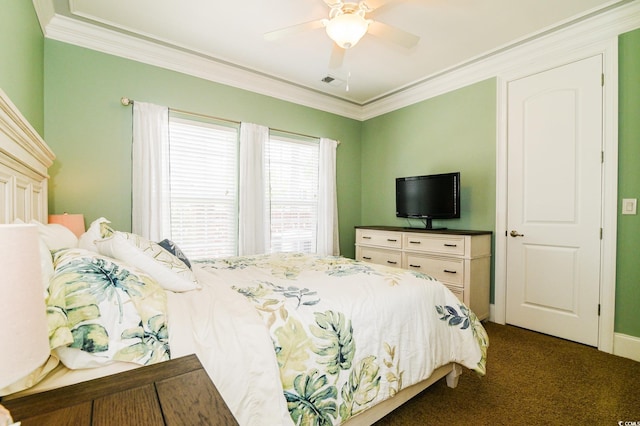 bedroom with dark carpet, ceiling fan, and crown molding