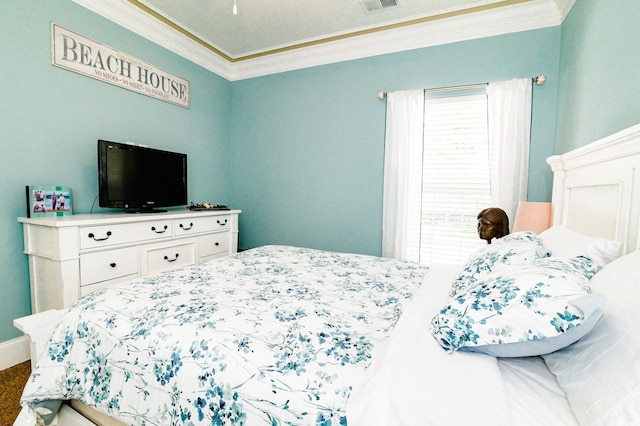 bedroom with carpet and ornamental molding