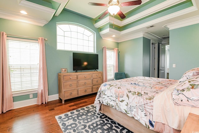 bedroom with ceiling fan, dark hardwood / wood-style flooring, and crown molding