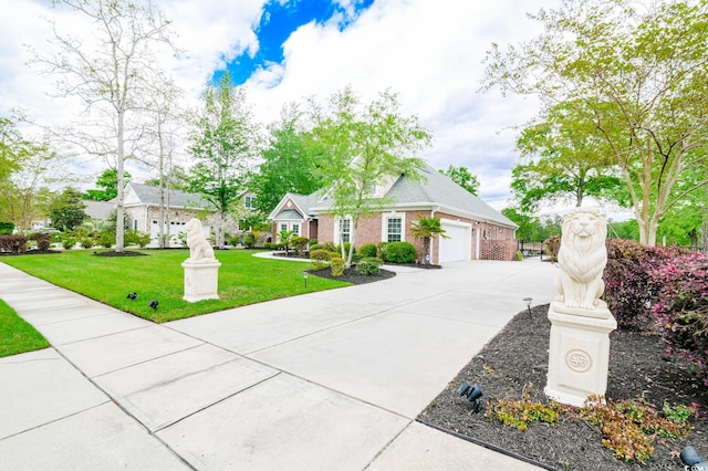 view of front facade with a front lawn and a garage