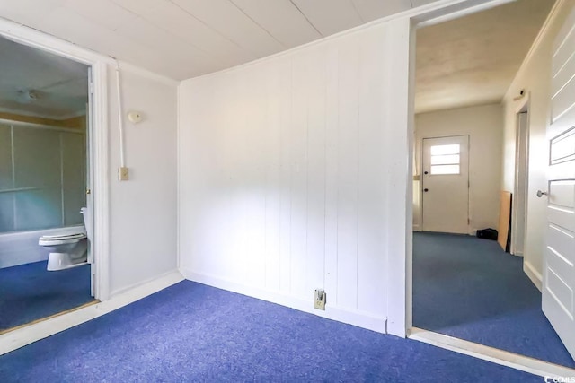 spare room featuring carpet floors