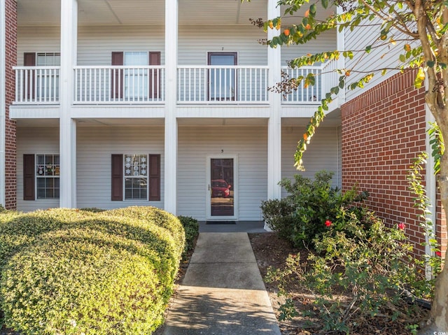 doorway to property with a balcony