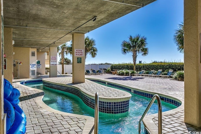 view of pool with a patio