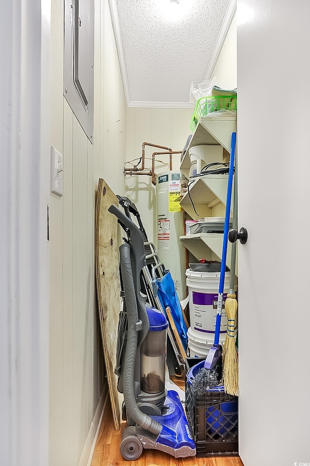 storage area featuring electric water heater