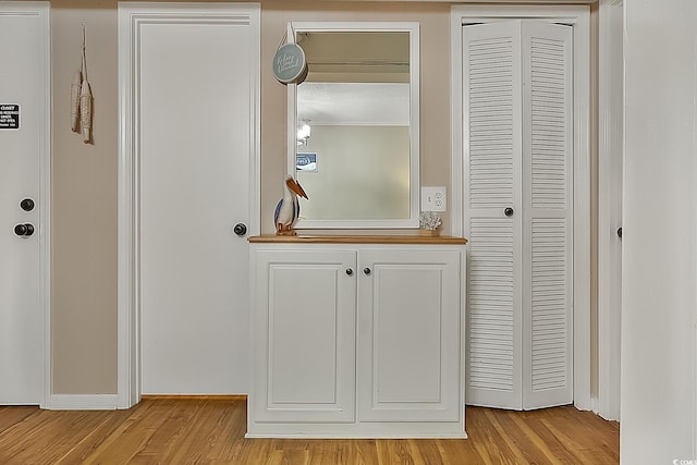 interior details featuring hardwood / wood-style flooring