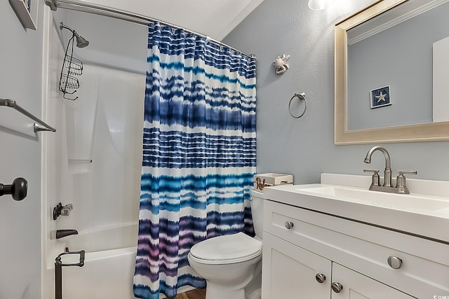 full bathroom with vanity, shower / bathtub combination with curtain, a textured ceiling, and toilet