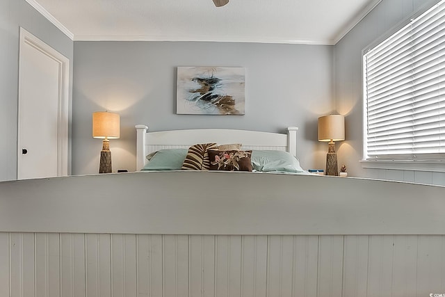 bedroom with ornamental molding