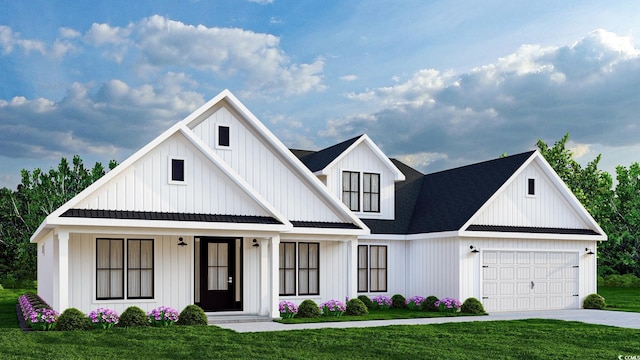 modern farmhouse style home featuring a porch, a garage, and a front lawn