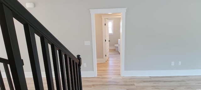 corridor featuring light hardwood / wood-style flooring