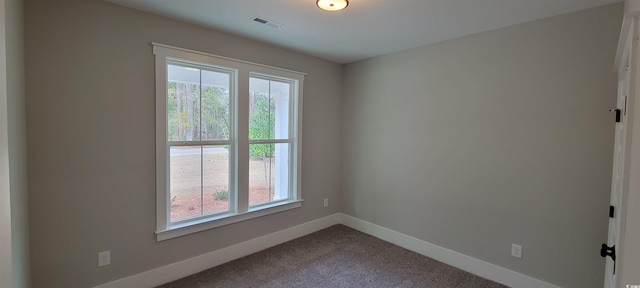 empty room featuring carpet floors