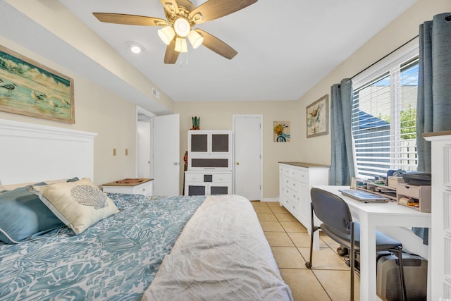 tiled bedroom featuring a closet and ceiling fan