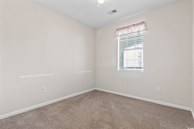 view of carpeted spare room