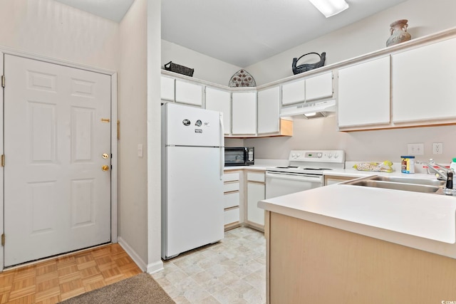 kitchen with white cabinetry, sink, light parquet flooring, and white appliances