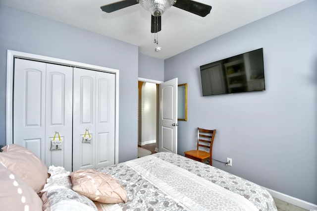 bedroom with carpet floors, a closet, and ceiling fan