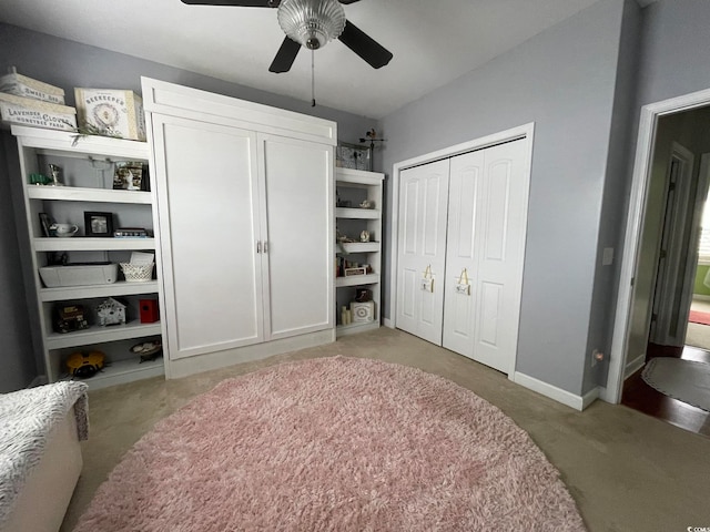 carpeted bedroom featuring ceiling fan