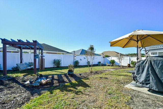 view of yard with a pergola