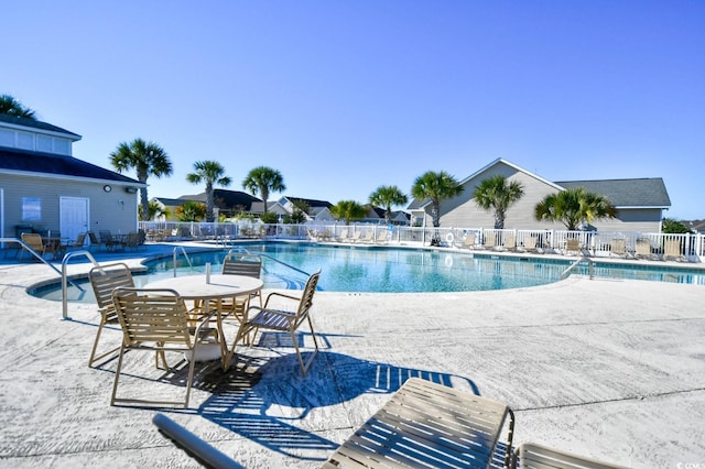 view of pool featuring a patio area