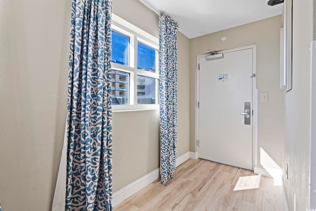 entrance foyer featuring light hardwood / wood-style floors