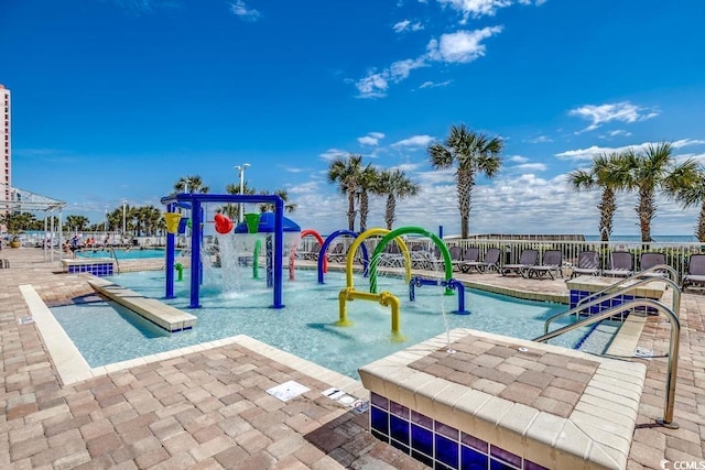 view of pool featuring pool water feature