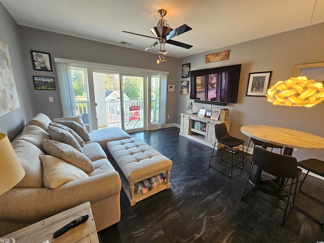 living room featuring ceiling fan