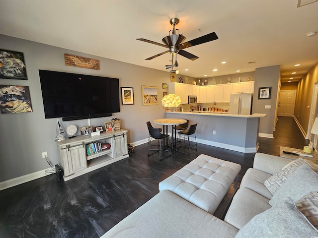 living room with ceiling fan