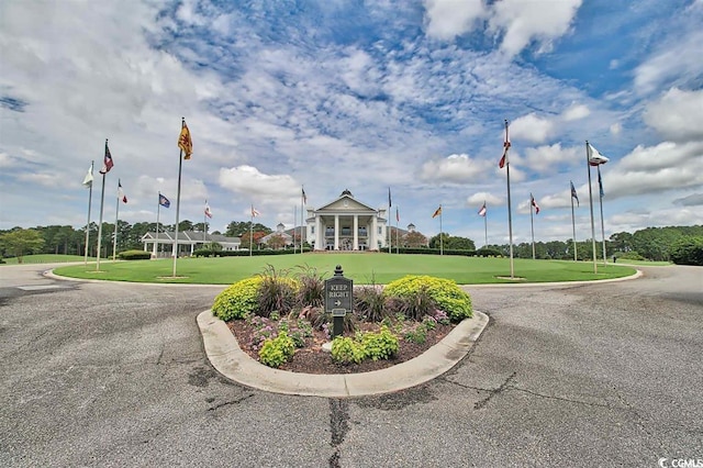 view of community with a lawn