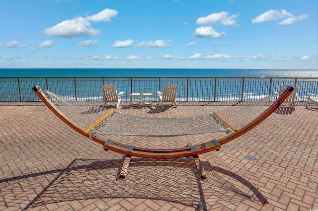 view of patio / terrace with a water view